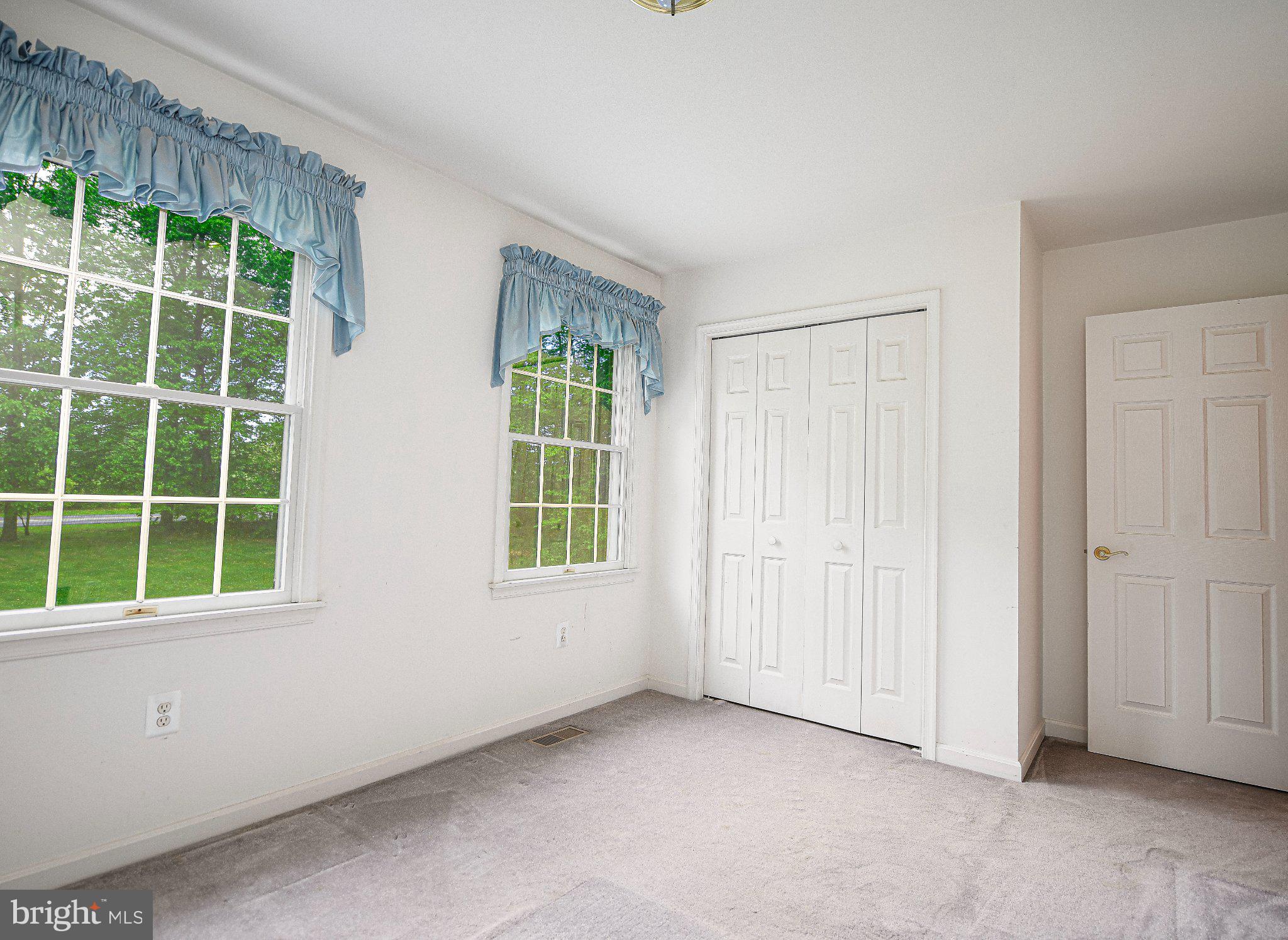 711 Gilbert Road Aberdeen, MD 21001 - Photo 18 of 54 an empty room with windows