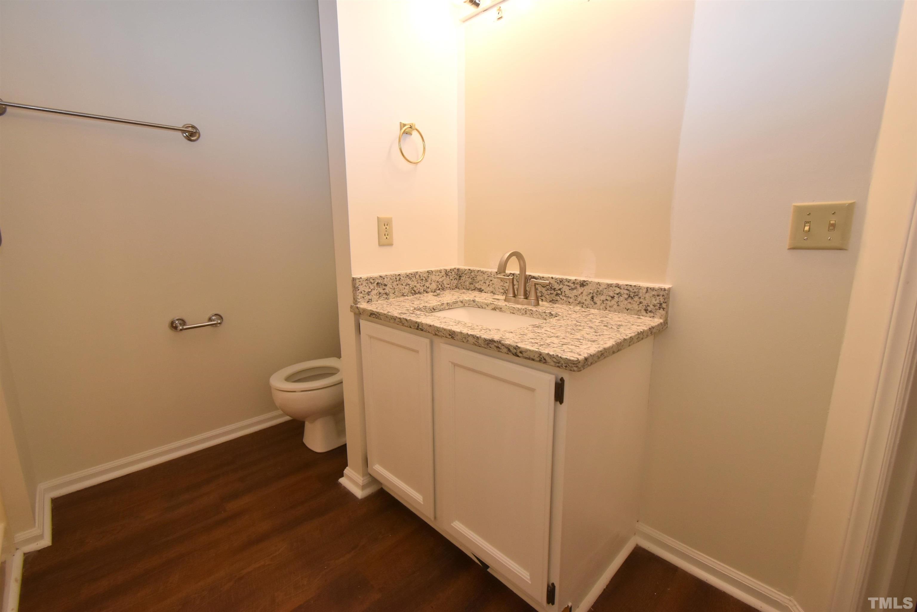 625 Windsong Lane Durham, NC 27713 - Photo 24 of 34 a bathroom with a sink and toilet