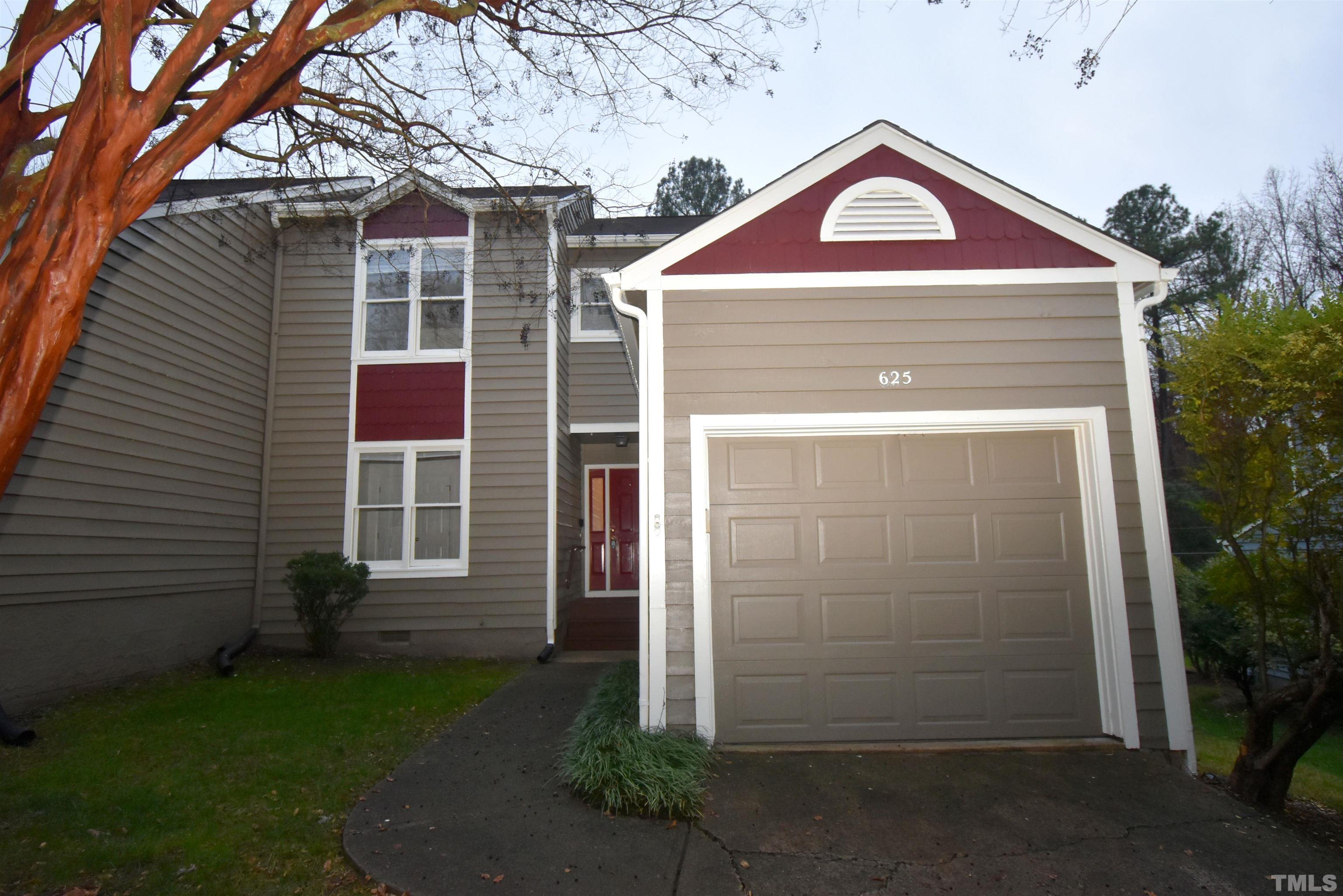 625 Windsong Lane Durham, NC 27713 - Photo 34 of 34 a front view of a house with a yard