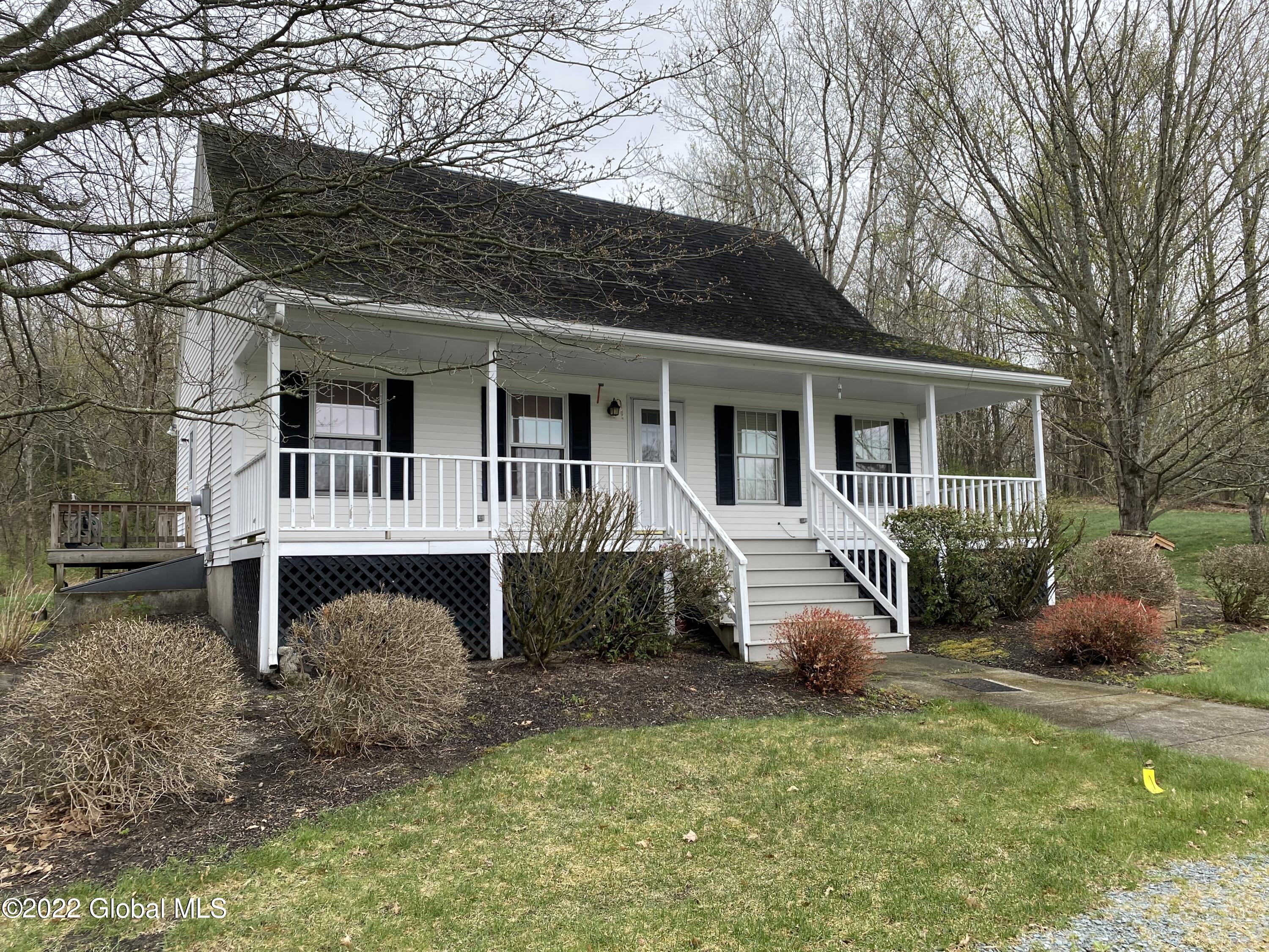 50 Aldous Road Granville, NY 12832 - Photo 5 of 8 A ROCKING CHAIR PORCH