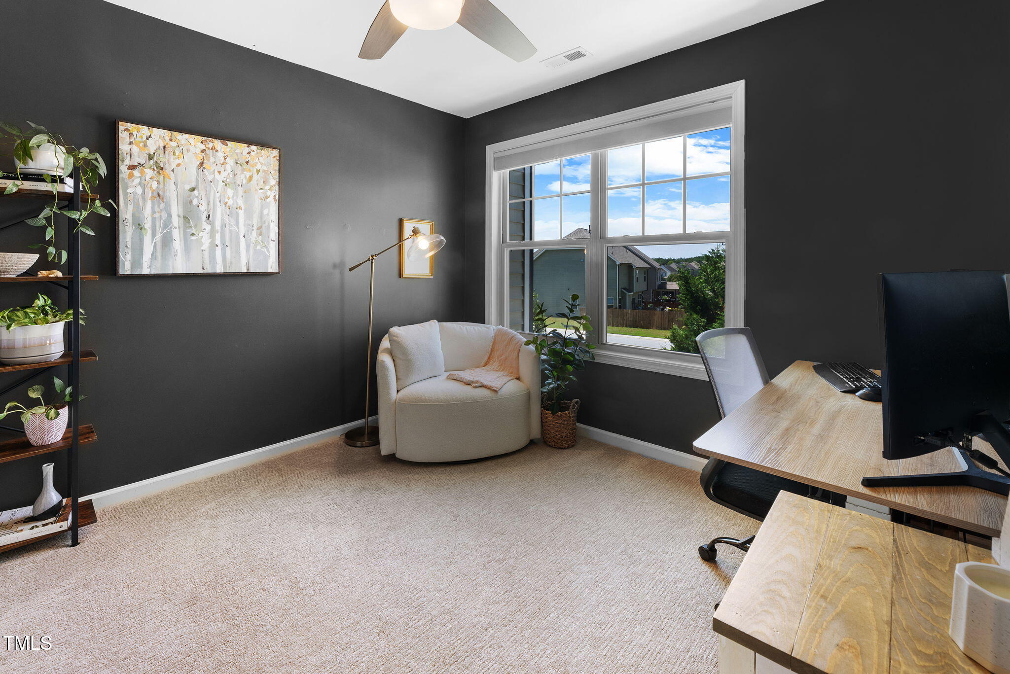 7807 Elmshire Way Raleigh, NC 27616 - Photo 27 of 32 a room with furniture and a window