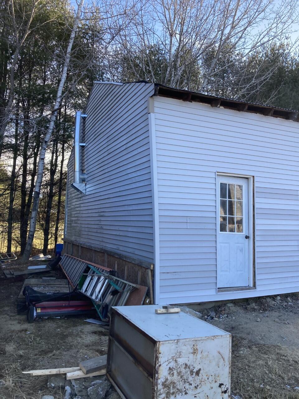 7 Page Road Livermore Falls, ME 04254 - Photo 19 of 20 0358 garage side