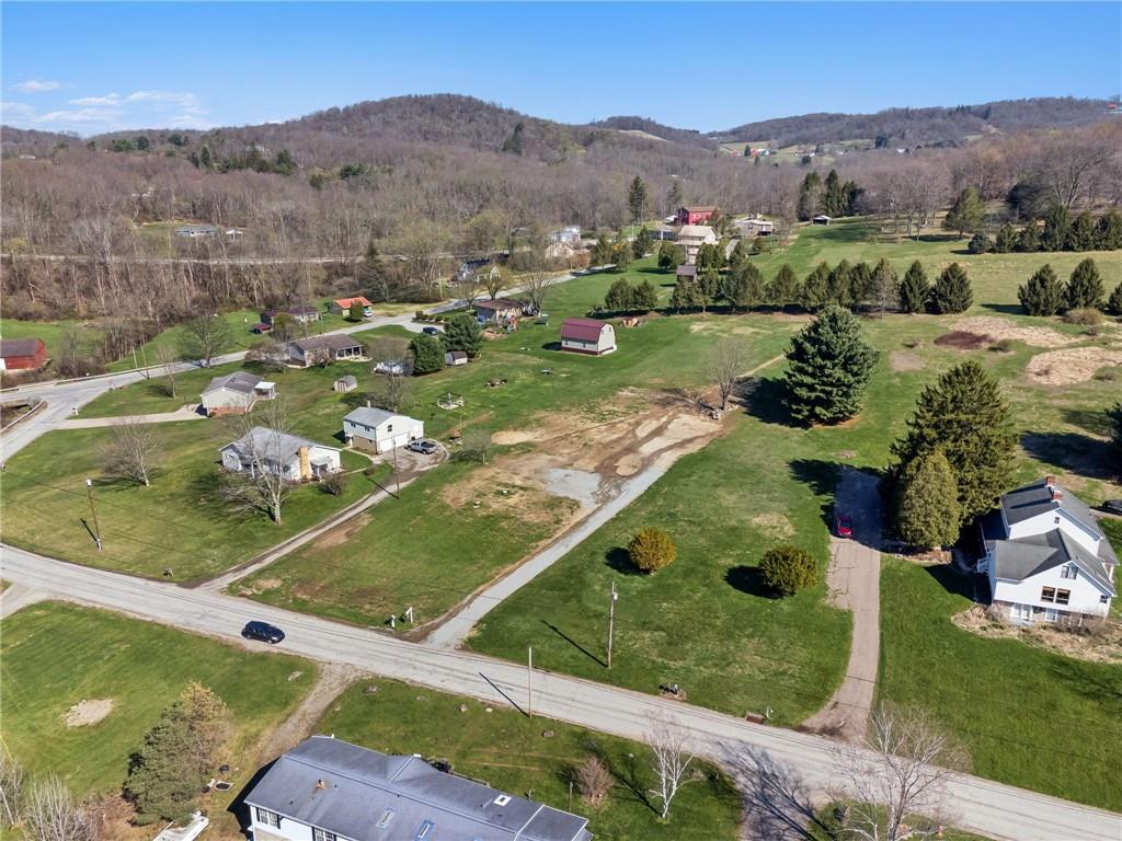 813 Edmon Road Apollo, PA 15613 - Photo 4 of 10 an aerial view of a house with a garden