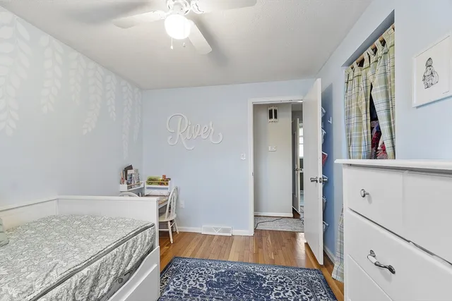 a bathroom with a sink toilet and vanity