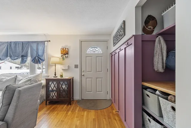 a kitchen with granite countertop a stove a sink and a cabinets