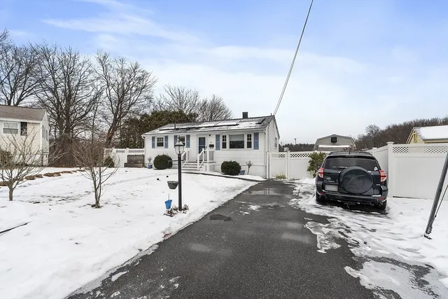 a view of a street with cars