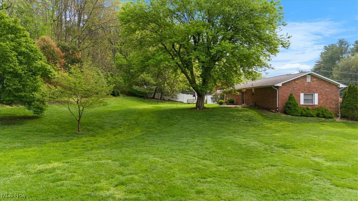 101 Robson Road Marietta, OH 45750 - Photo 4 of 35 Rear Yard offers space for outdoor activities and privacy along the back property line.