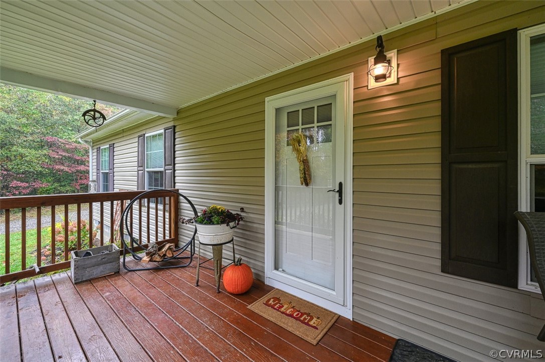 5764 Community House Road Columbia, VA 23038 - Photo 19 of 48 a view of a porch with wooden floor