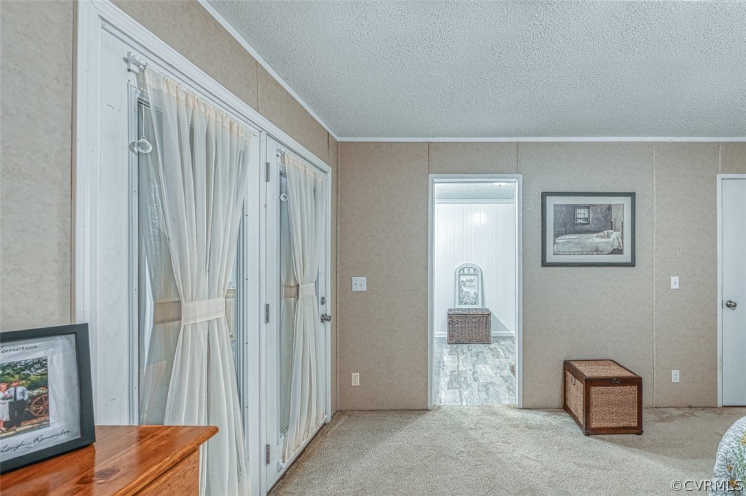 5764 Community House Road Columbia, VA 23038 - Photo 32 of 48 a view of a hallway with workspace livingroom with furniture and windows
