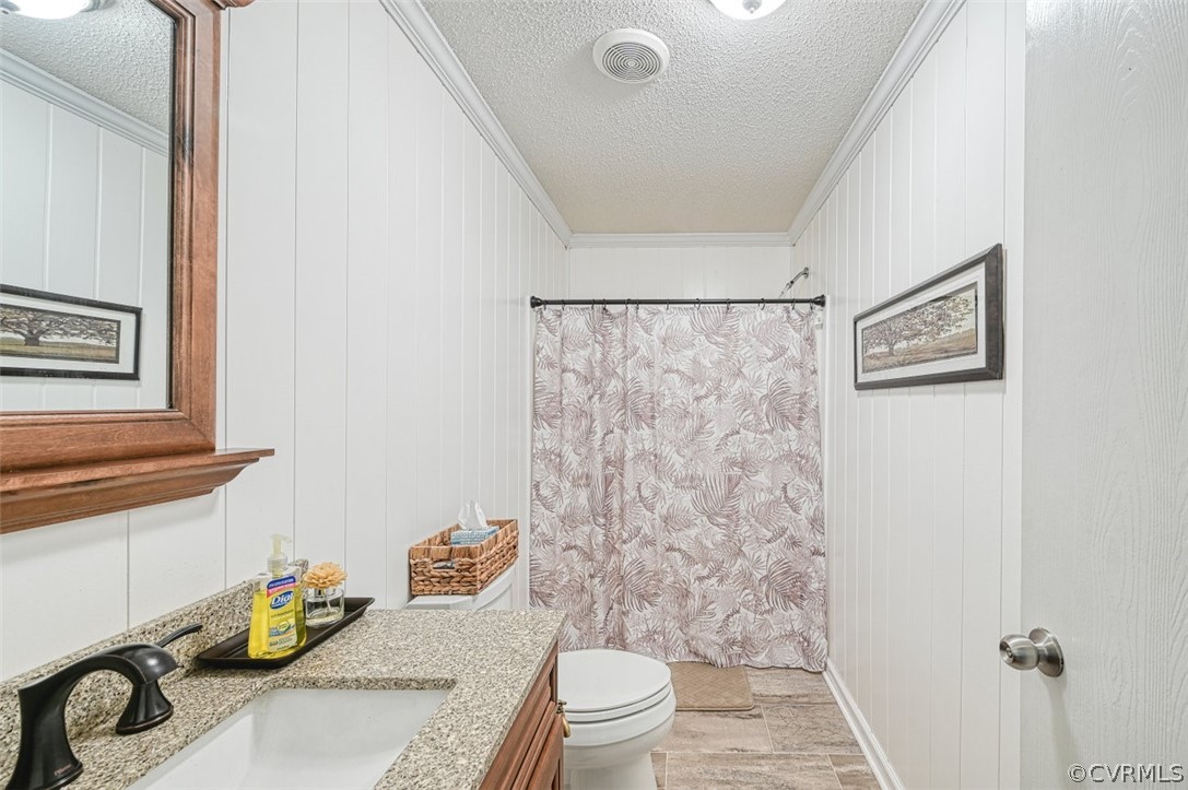 5764 Community House Road Columbia, VA 23038 - Photo 38 of 48 a bathroom with a sink toilet and shower