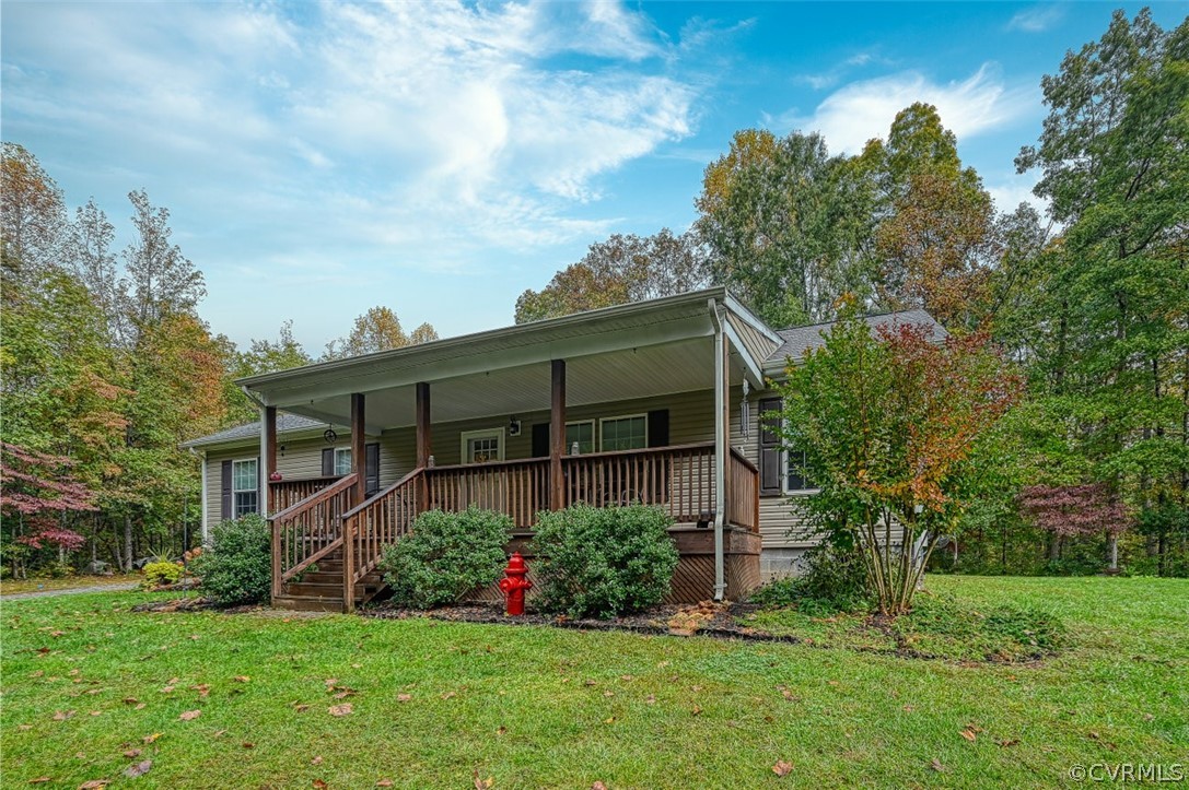 5764 Community House Road Columbia, VA 23038 - Photo 4 of 48 a view of a house with garden