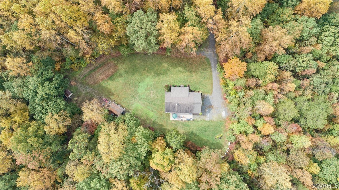 5764 Community House Road Columbia, VA 23038 - Photo 42 of 48 a aerial view of a house with a yard and large trees