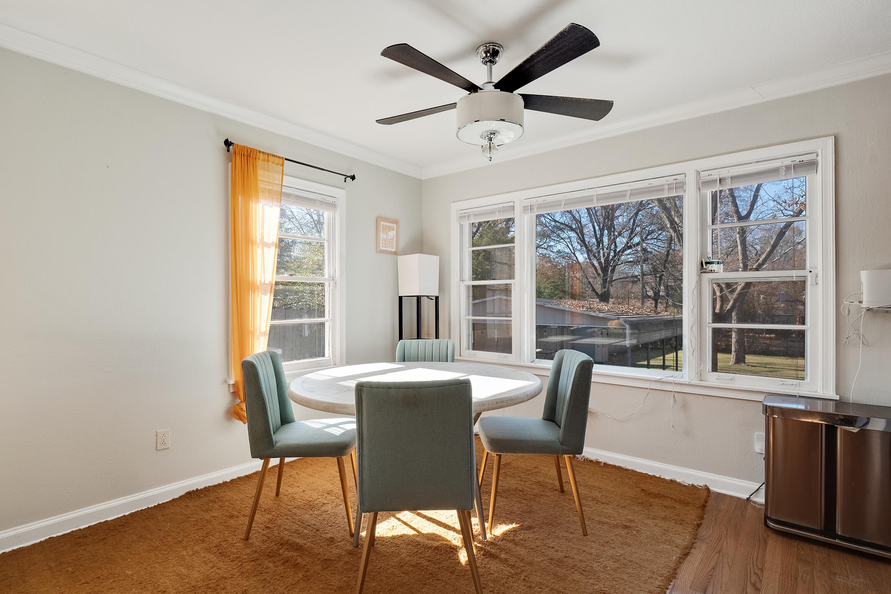 1303 Colonial Road Memphis, TN 38117 - Photo 8 of 38 a view of a dining room with furniture window and outside view