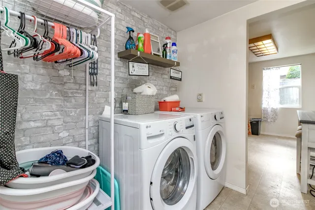 a bathroom with a washer and dryer