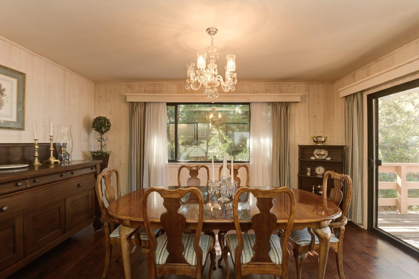 3084 Sloat Road Pebble Beach, CA 93953 - Photo 17 of 38 a view of a dining room with furniture window and outside view