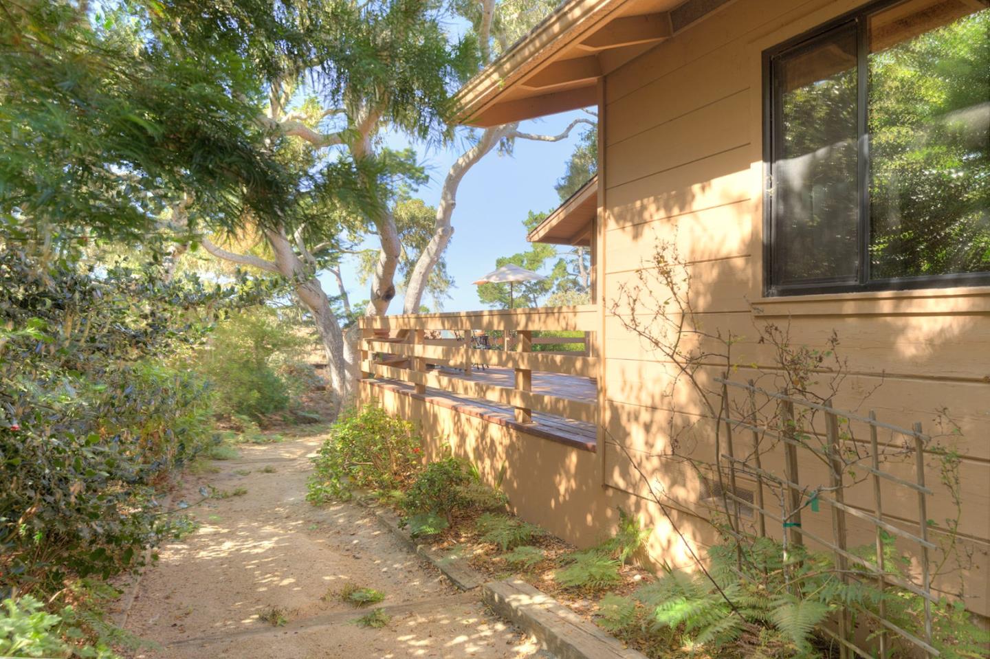 3084 Sloat Road Pebble Beach, CA 93953 - Photo 29 of 38 a backyard of a house