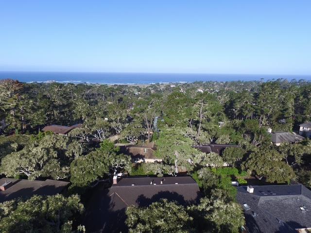 3084 Sloat Road Pebble Beach, CA 93953 - Photo 5 of 38 an aerial view of a house with a yard