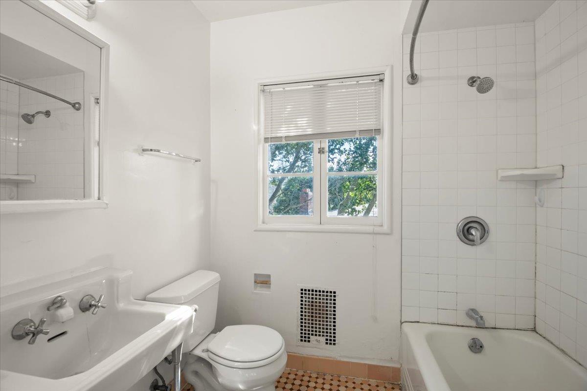 1526 Arch Street Berkeley, CA 94708 - Photo 16 of 27 a bathroom with a sink toilet and shower