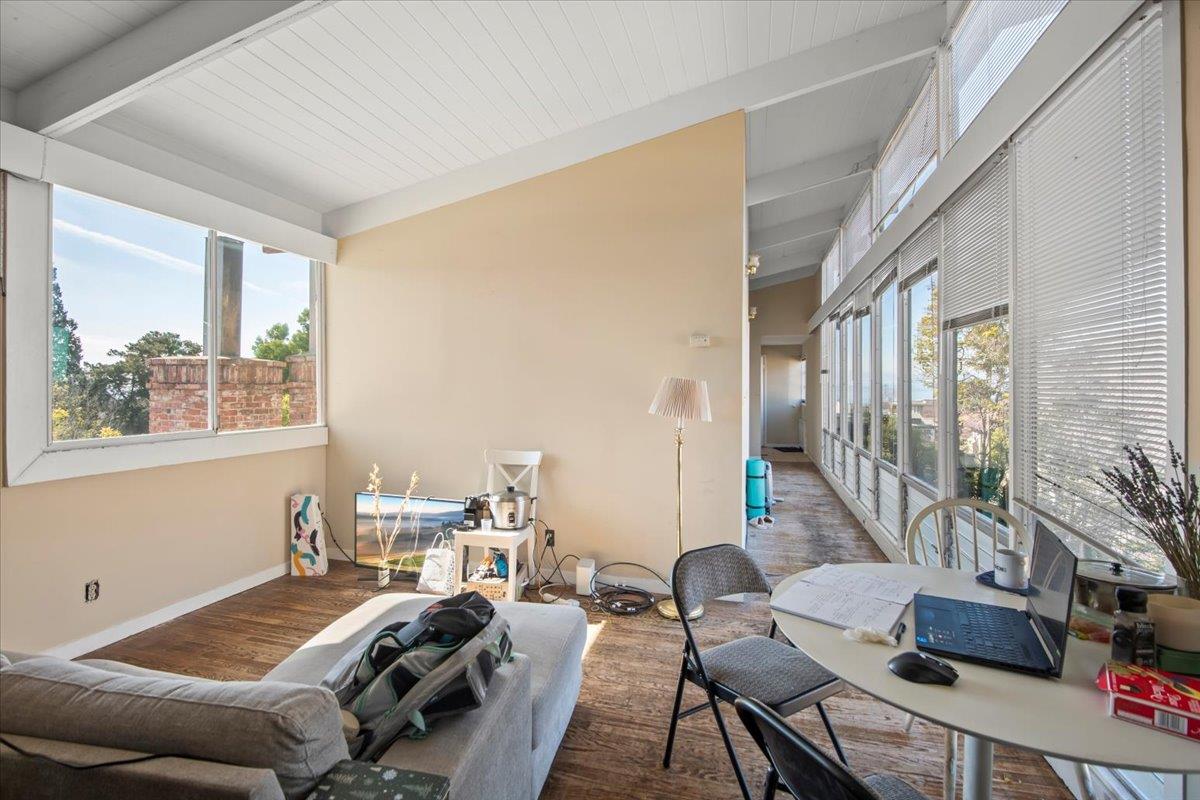 1526 Arch Street Berkeley, CA 94708 - Photo 23 of 27 a bedroom with furniture and a large window