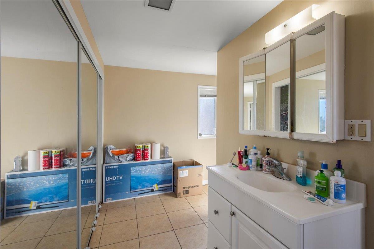 1526 Arch Street Berkeley, CA 94708 - Photo 25 of 27 a kitchen with a sink and cabinets