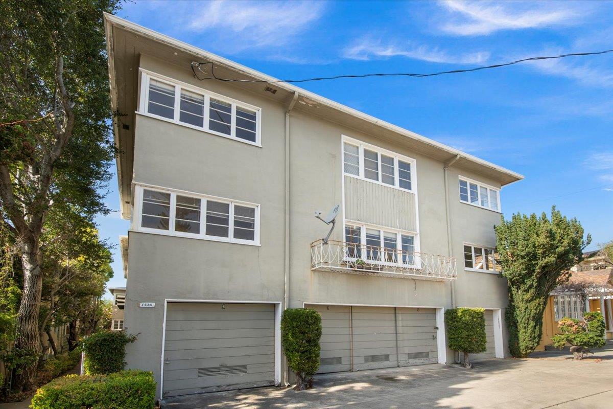 1526 Arch Street Berkeley, CA 94708 - Photo 4 of 27 a front view of a house with a yard