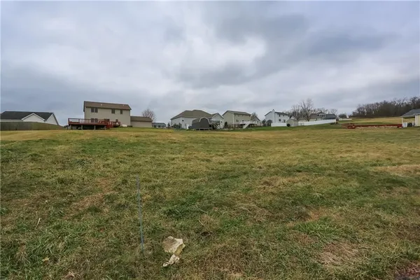 a view of a town with ocean view