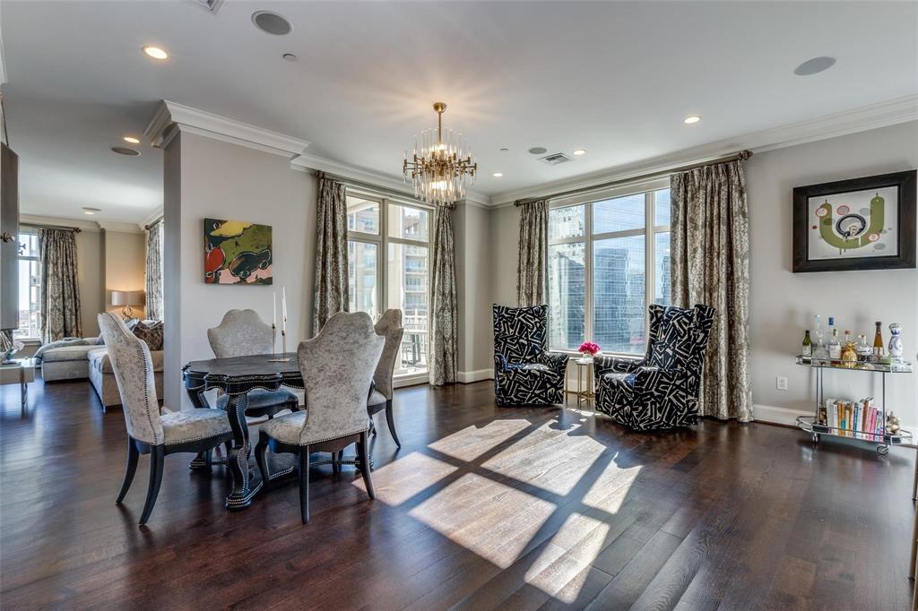 2555 North Pearl Street, Unit 1402 Dallas, TX 75201 - Photo 8 of 25 a living room with furniture and wooden floor