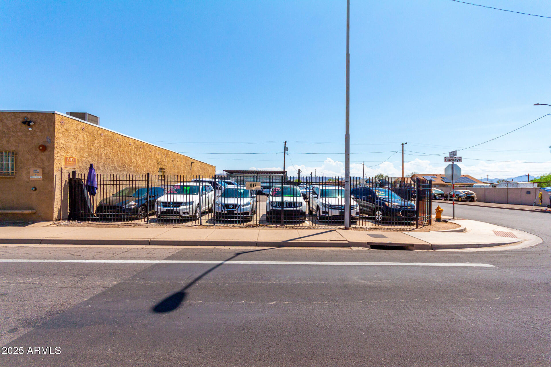 1117 West Buckeye Road, Unit 5 Phoenix, AZ 85007 - Photo 11 of 32 a view of street with cars