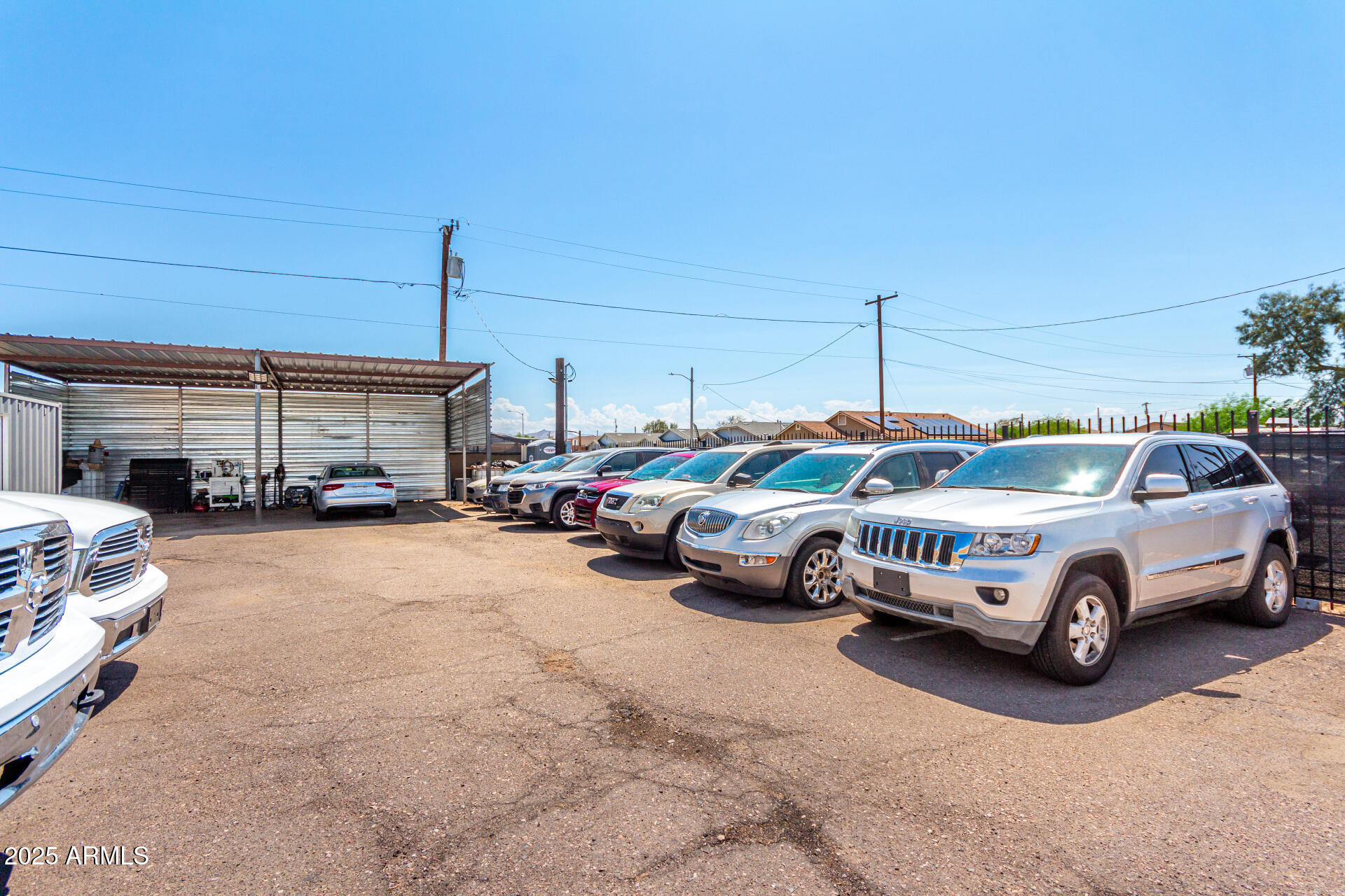 1117 West Buckeye Road, Unit 5 Phoenix, AZ 85007 - Photo 15 of 32 a car parked in a parking lot