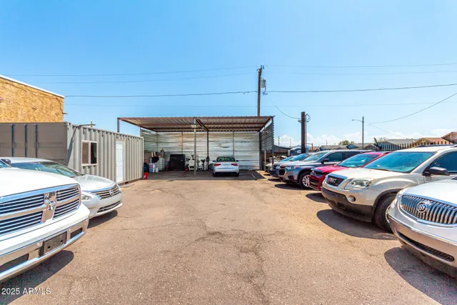 a view of car parked on the side of a road
