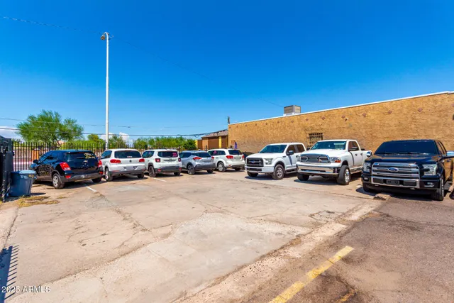 a view of a cars parked in front of a building