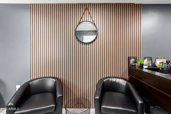 a room with furniture and book shelf