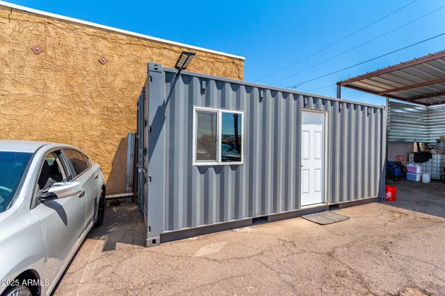a view of a backyard of the house