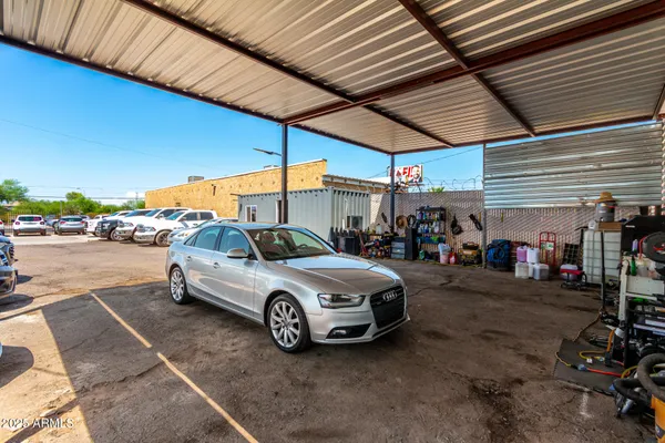 a view of parking garage with cars