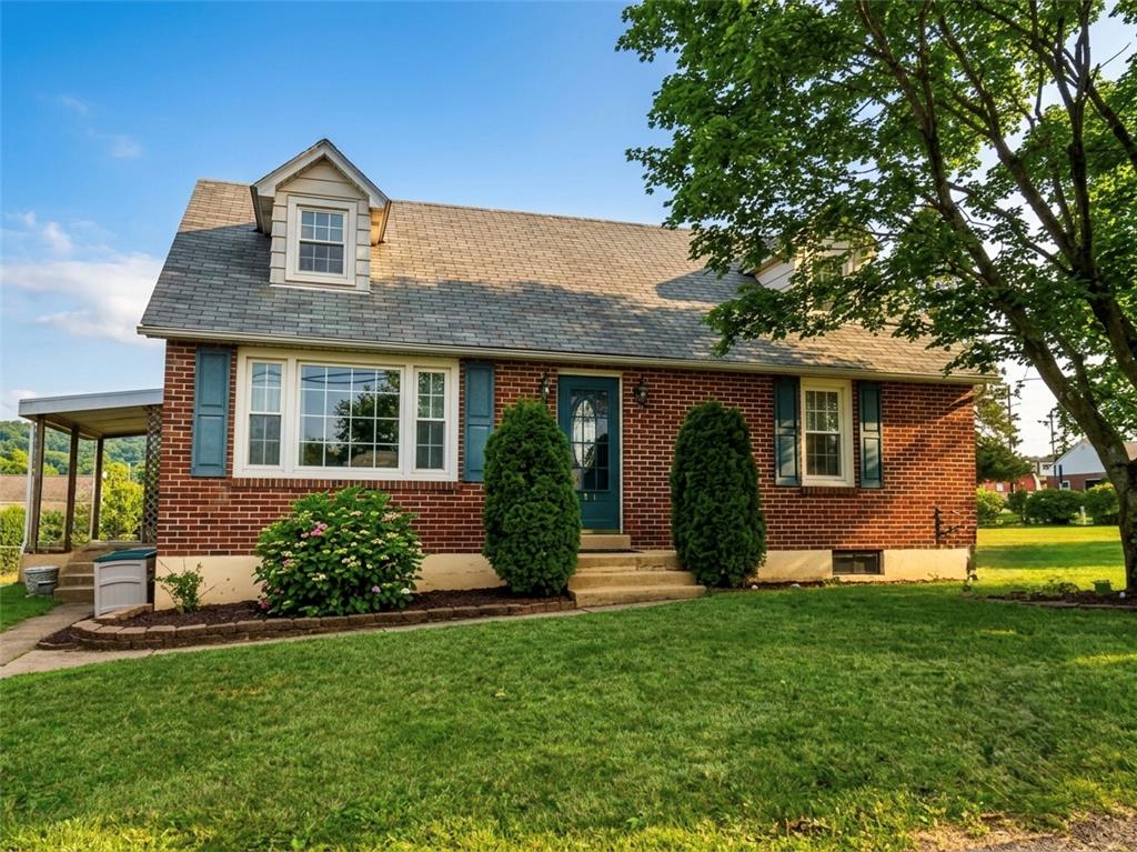 120 Harrison Street Emmaus, PA 18049 - Photo 1 of 2 Brick facade and dormer window add charm to this inviting residence.