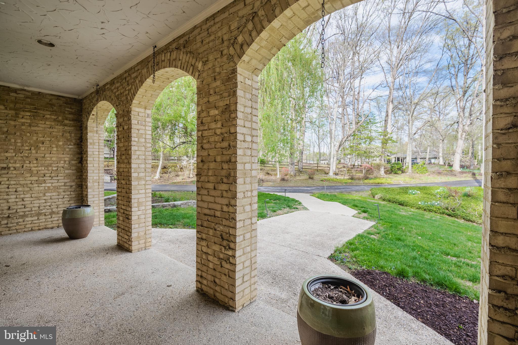 10100 Iron Gate Road Potomac, MD 20854 - Photo 11 of 16 a view of a garden with patio
