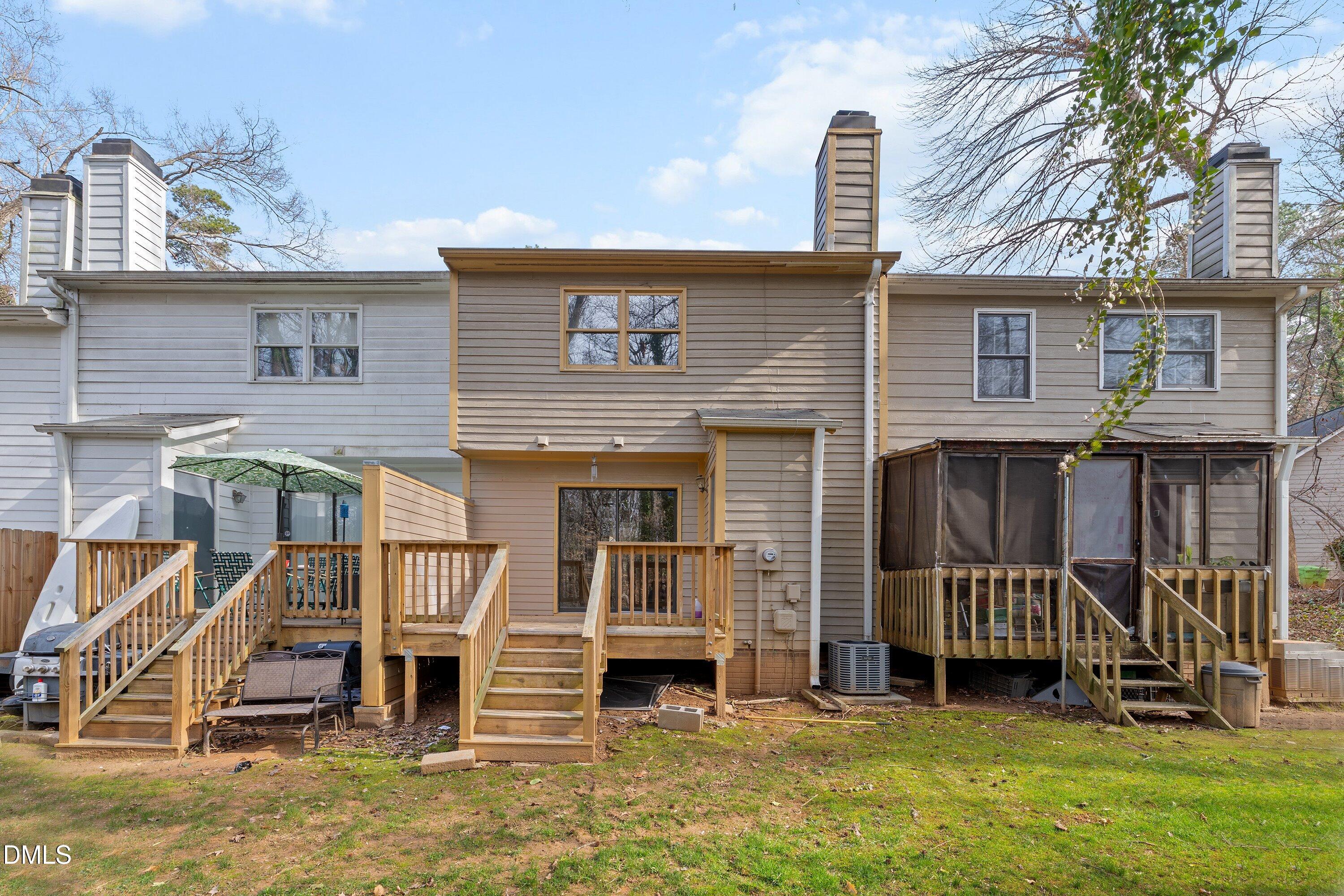887 Dalewood Drive Raleigh, NC 27610 - Photo 17 of 21 a front view of a house with a garden