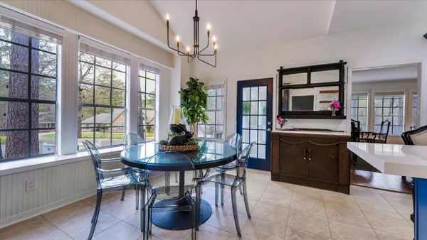 a kitchen with a stove and a refrigerator