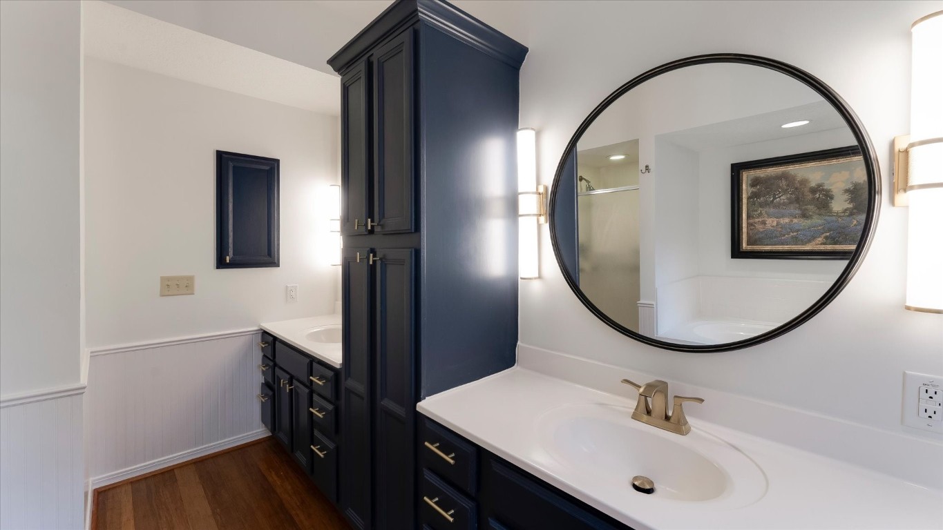 100 Lords Circle Coldspring, TX 77331 - Photo 24 of 50 a bathroom with a sink and a mirror