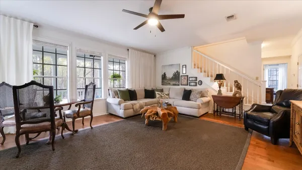 a view of a house with a yard and garage