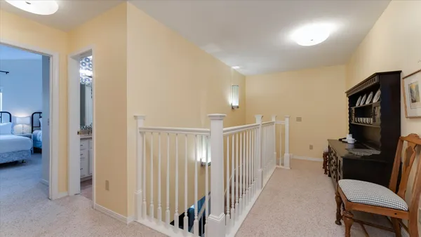 a view of a house with swimming pool and a yard