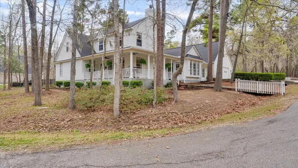 a view of garage and yard