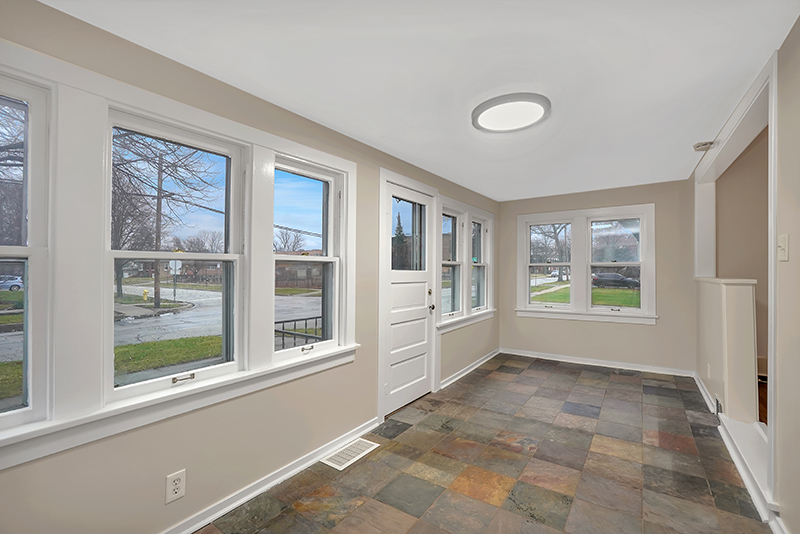 4716 Douglas Road Downers Grove, IL 60515 - Photo 3 of 18 a view of an empty room with a window