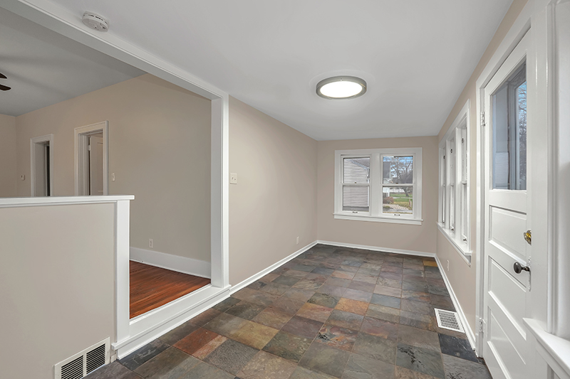 4716 Douglas Road Downers Grove, IL 60515 - Photo 4 of 18 wooden floor in an empty room with a window