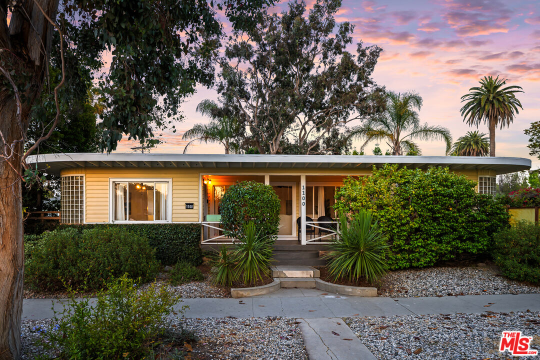 1100 Victoria Avenue Venice, CA 90291 - Photo 1 of 30 a front view of house with yard and trees around