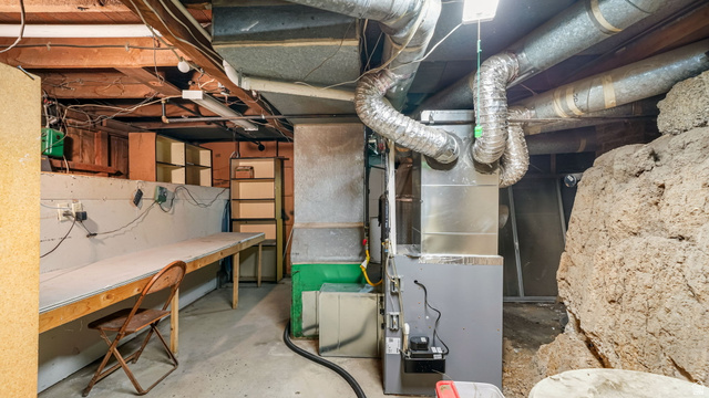 44 Shriver Street Eureka, UT 84628 - Photo 21 of 43 Basement utility space featuring exposed ceiling joists, various ductwork, and a furnace unit