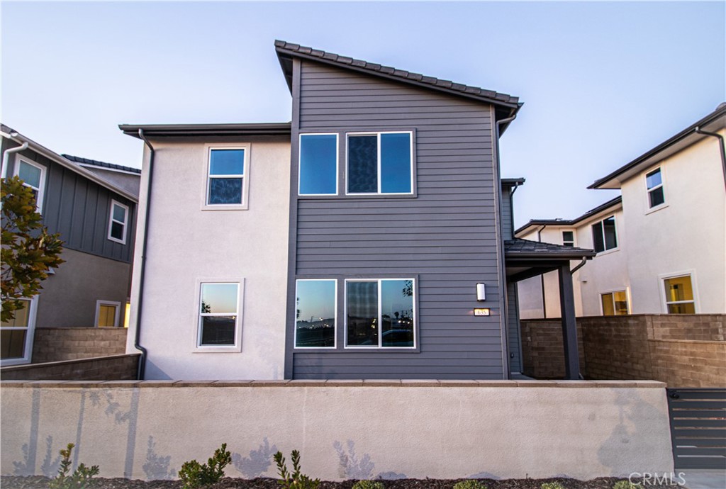 635 Gadwall Irvine, CA 92618 - Photo 1 of 27 a front view of a house with glass windows