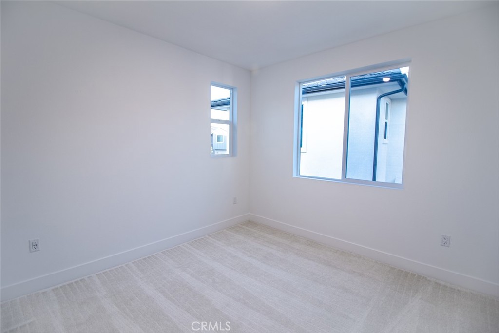 635 Gadwall Irvine, CA 92618 - Photo 13 of 27 an empty room that has a window