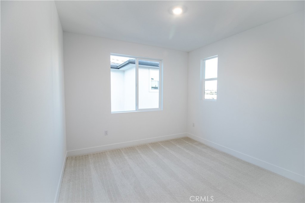 635 Gadwall Irvine, CA 92618 - Photo 15 of 27 an empty room with windows