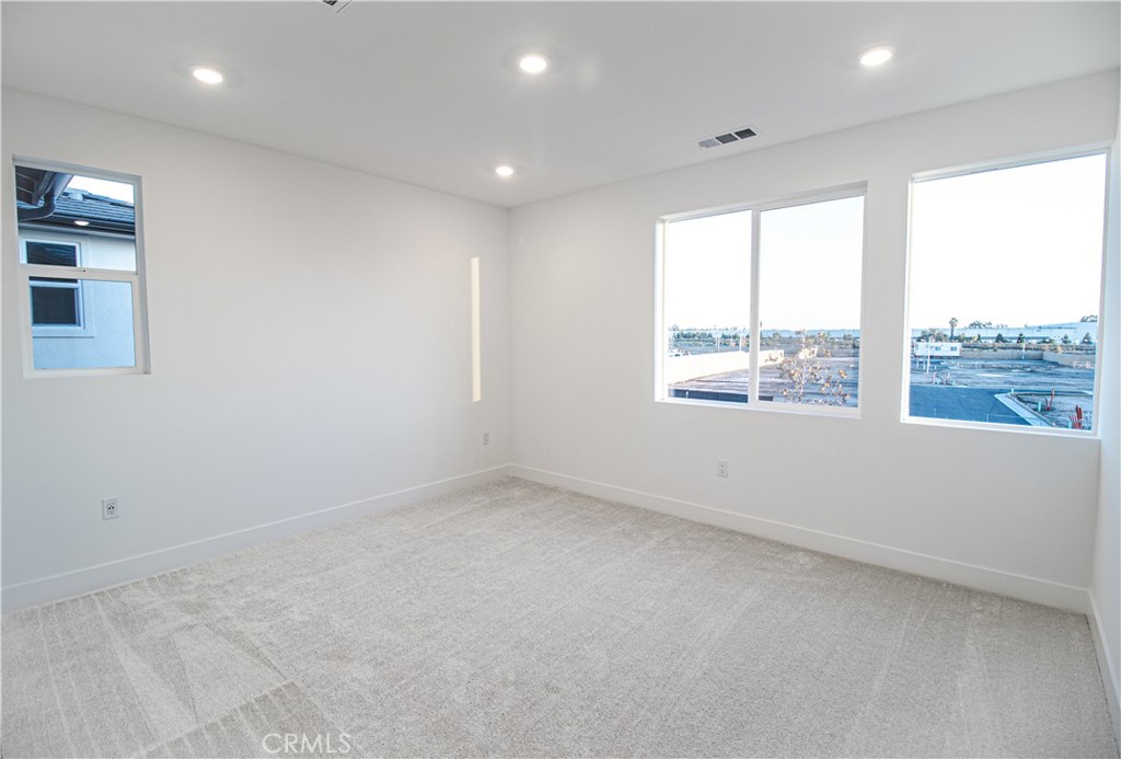 635 Gadwall Irvine, CA 92618 - Photo 16 of 27 an empty room with windows